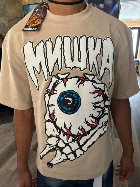 Mishka Other - Mishka Beige Short-Sleeve Tee with Graphic Eyeball and Dripping Logo